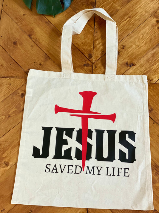 Jesus saved my life Tote bags